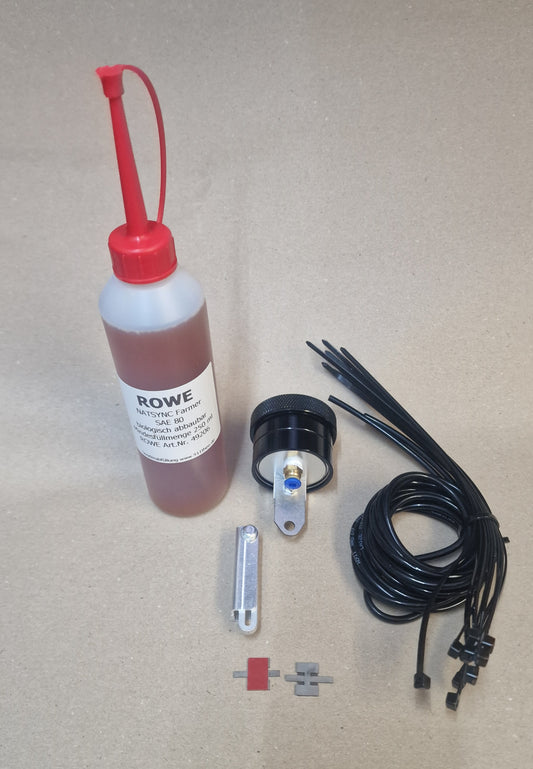 Kettenöler: automatischer Antriebsketten Öler im Set mit biologisch leicht abbaubarem ROWE Natsync Öl